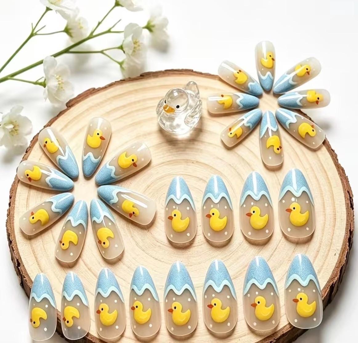 Yellow Duck Press-On Nails – Medium Almond Shape, Milky Blue Wavy Summer Manicure