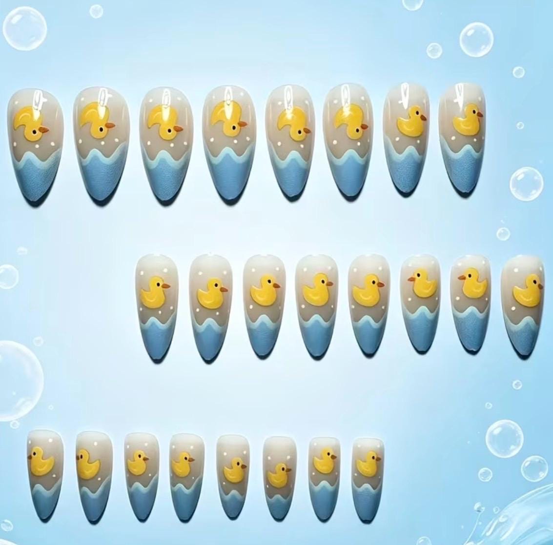 Yellow Duck Press-On Nails – Medium Almond Shape, Milky Blue Wavy Summer Manicure